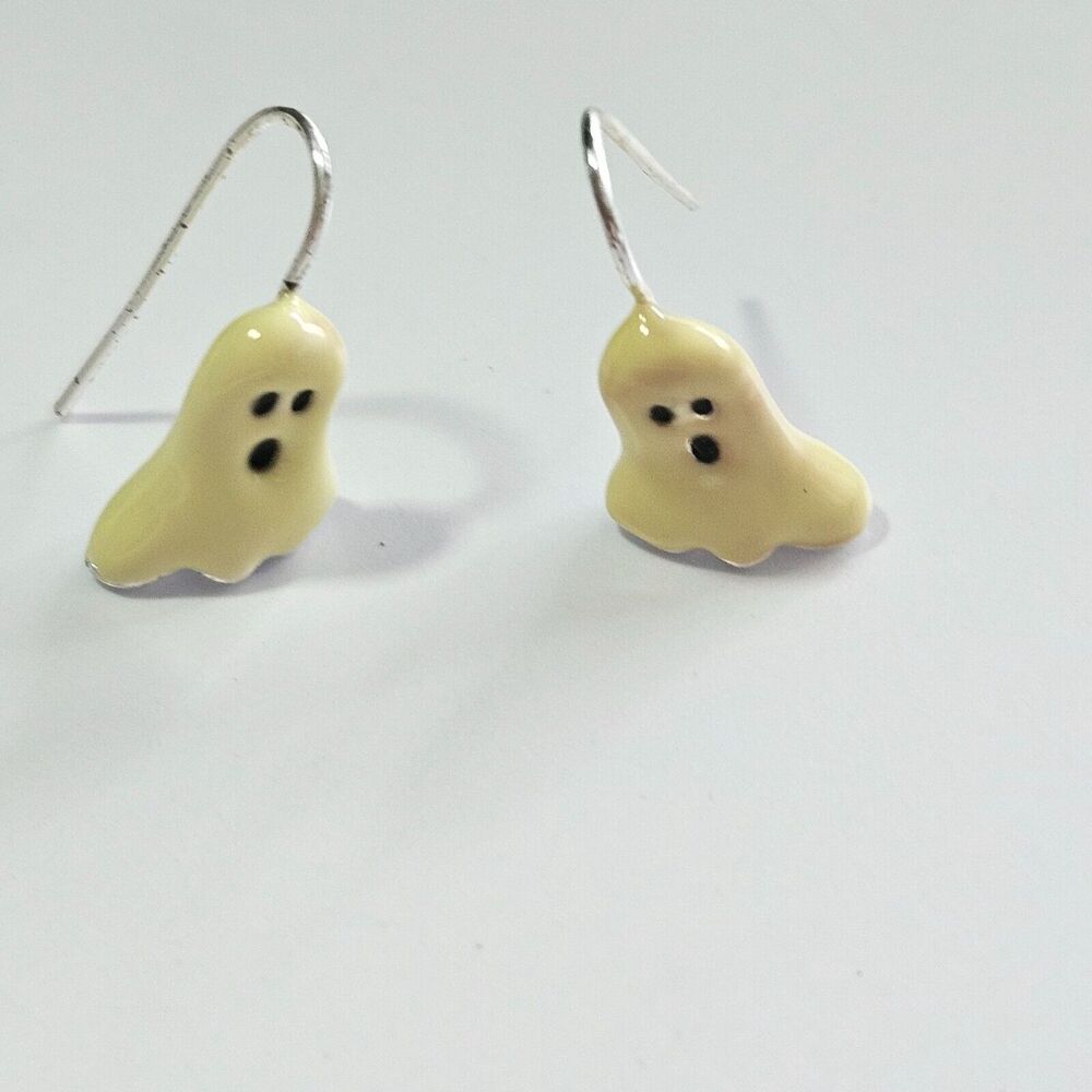 Avon silver tone enamel ghost earrings